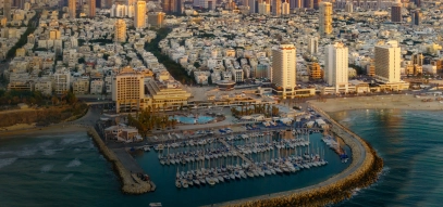 About us Tel Aviv coast sea buildings city header 1600x700 DARK.jpg